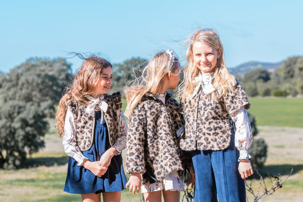 ABRIGO RIZO ANIMAL PRINT