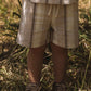 SHORT RAYAS BEIGE NIÑO