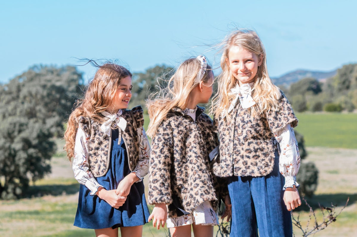 CAPA ANIMAL PRINT RIZO